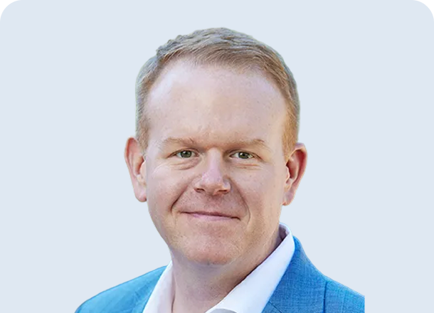 Portrait of Ethan Fitzsimons, Senior Vice President, Global Customer Engagement.