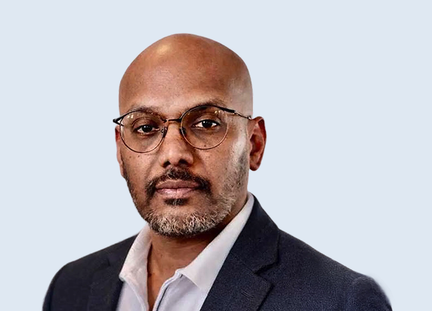 Portrait of Sarah Mitchell, President and Chief Operating.